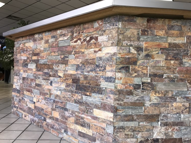 Stacked stone tile veneer counter display.