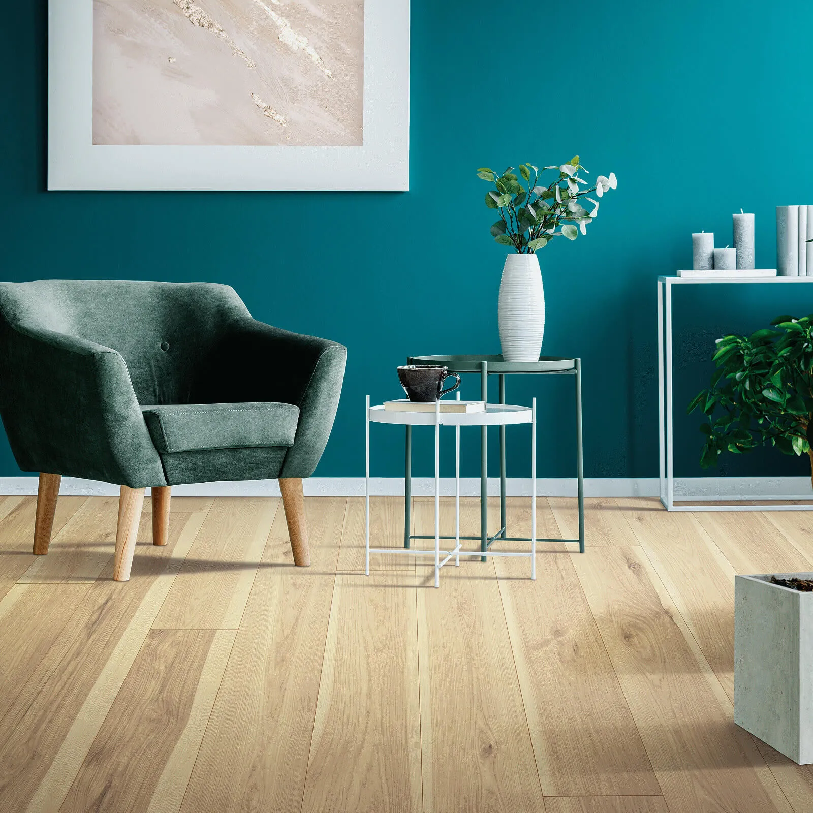 Light wood laminate flooring in a sitting area with teal walls.